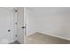 Bedroom with new carpeting, ample space and a bright, neutral color palette at 1409 S Kiel Ave, Indianapolis, IN 46241