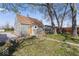 View of the exterior of the home from the backyard at 1409 S Kiel Ave, Indianapolis, IN 46241