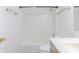 Bright bathroom with a shower and white tub/shower combo at 14117 Princewood Dr, Fishers, IN 46037