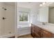 Bathroom with separate shower and garden tub at 14117 Princewood Dr, Fishers, IN 46037
