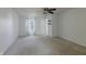 Spacious bedroom with ceiling fan and shelves at 14117 Princewood Dr, Fishers, IN 46037