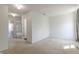 A bright bedroom with carpet flooring, neutral walls and window overlooking a leafy landscape at 14117 Princewood Dr, Fishers, IN 46037
