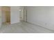 Carpeted bedroom features an open door to a closet and hallway at 14117 Princewood Dr, Fishers, IN 46037