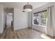 Inviting dining room with ample natural light and new wood-look flooring at 14117 Princewood Dr, Fishers, IN 46037