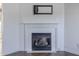 Elegant fireplace with a white mantel, adding a touch of sophistication to the living space at 14117 Princewood Dr, Fishers, IN 46037