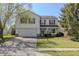 Charming two-story home featuring red shutters, a two-car garage, and well-maintained landscaping at 14117 Princewood Dr, Fishers, IN 46037