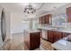 Renovated kitchen featuring an island, stainless steel appliances, and dining area at 14117 Princewood Dr, Fishers, IN 46037