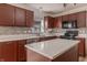 A spacious kitchen with stainless steel appliances, white countertops and ample cabinet space at 14117 Princewood Dr, Fishers, IN 46037