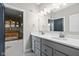 Bathroom featuring double sinks, white countertops, and a modern design at 14872 Autumn View Way, Fishers, IN 46037