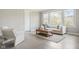 Bright living room with large windows and neutral-toned furniture at 14872 Autumn View Way, Fishers, IN 46037