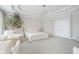 Large main bedroom features neutral colors, tray ceilings and a tree accent at 14872 Autumn View Way, Fishers, IN 46037