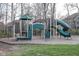 Community playground featuring a green slide and climbing structure for outdoor fun at 14872 Autumn View Way, Fishers, IN 46037