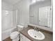Cozy bathroom featuring a vanity with sink, toilet and bathtub for convenience at 15507 Dry Creek Rd, Noblesville, IN 46060