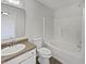 Clean bathroom with a shower-tub combination, a single sink vanity, and tile flooring at 15507 Dry Creek Rd, Noblesville, IN 46060