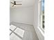 Well-lit room with neutral walls, carpet flooring, ceiling fan and a window offering natural light at 15507 Dry Creek Rd, Noblesville, IN 46060