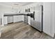 Modern kitchen with stainless steel appliances, sleek countertops, and ample cabinet space at 15507 Dry Creek Rd, Noblesville, IN 46060
