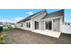 Exterior of home with gray siding, sliding glass doors, and a concrete patio at 16870 Imperial Ct, Fishers, IN 46040