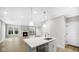 Stylish kitchen featuring a center island, pendant lighting, and modern appliances at 16870 Imperial Ct, Fishers, IN 46040