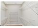 Organized walk-in closet with white wire shelving at 16870 Imperial Ct, Fishers, IN 46040