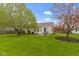 Spacious backyard features a lush lawn and patio area perfect for outdoor entertaining at 17072 Newberry Ln, Westfield, IN 46074