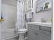 A lovely bathroom with a shower and tub combination featuring a grey vanity for storage at 17072 Newberry Ln, Westfield, IN 46074