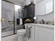 Updated bathroom featuring a tiled shower with a glass door and modern fixtures at 17072 Newberry Ln, Westfield, IN 46074