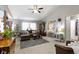 Spacious living room with vaulted ceilings, neutral walls, plush carpeting and a large sectional sofa at 17072 Newberry Ln, Westfield, IN 46074