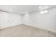 Bright basement featuring recessed lighting, wood-look flooring, and multiple windows for natural light at 2009 N Bosart Ave, Indianapolis, IN 46218