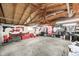 Spacious garage interior with ample storage and a variety of equipment and supplies at 2009 N Bosart Ave, Indianapolis, IN 46218