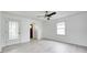 Inviting living room with new floors and natural light from the large window at 2009 N Bosart Ave, Indianapolis, IN 46218