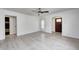 Bright living room showcasing new floors, white walls, and classic archway at 2009 N Bosart Ave, Indianapolis, IN 46218