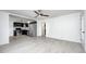 Open concept living space with stainless steel appliances and modern finishes at 2009 N Bosart Ave, Indianapolis, IN 46218