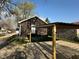Property view with carport and an easy to maintain backyard at 2115 N Leland Ave, Indianapolis, IN 46218