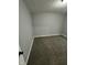 Neutral bedroom with soft carpet and gray walls at 2115 N Leland Ave, Indianapolis, IN 46218