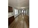 Open-concept kitchen and living room featuring modern finishes and neutral paint at 2115 N Leland Ave, Indianapolis, IN 46218