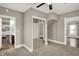 Spacious bedroom with mirrored closet and neutral carpeting at 221 N Munsie St, Indianapolis, IN 46229