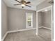 Neutral bedroom featuring carpet and large closet at 221 N Munsie St, Indianapolis, IN 46229