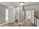 Upstairs hallway featuring access to bathroom and bedroom at 221 N Munsie St, Indianapolis, IN 46229