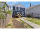 Spacious backyard with new sod and a wooden deck at 2326 Guilford Ave, Indianapolis, IN 46205