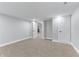 Unfurnished basement with white trim, neutral colored walls, and several doorways at 2326 Guilford Ave, Indianapolis, IN 46205