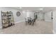Open basement area with a dining table and a display shelf at 2326 Guilford Ave, Indianapolis, IN 46205