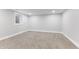 Unfurnished basement room with a window and neutral-colored walls at 2326 Guilford Ave, Indianapolis, IN 46205