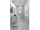 Stylish powder room with marble floors, modern vanity, and sleek fixtures at 2326 Guilford Ave, Indianapolis, IN 46205