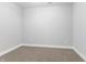 This room is carpeted and has a neutral wall color and white trim at 2326 Guilford Ave, Indianapolis, IN 46205