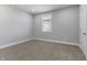 Unfurnished bedroom with a window and neutral-colored walls at 2326 Guilford Ave, Indianapolis, IN 46205