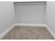 This walk-in closet has carpet and white trim at 2326 Guilford Ave, Indianapolis, IN 46205