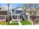 Charming two-story home featuring a welcoming front porch and freshly landscaped yard at 2326 Guilford Ave, Indianapolis, IN 46205