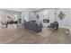 Open concept living and dining area with hardwood floors and modern decor at 2326 Guilford Ave, Indianapolis, IN 46205