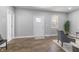 Bright living room features hardwood floors, and natural light, creating a welcoming atmosphere at 2326 Guilford Ave, Indianapolis, IN 46205