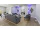 Modern living room with hardwood floors, a fireplace, and contemporary lighting at 2326 Guilford Ave, Indianapolis, IN 46205